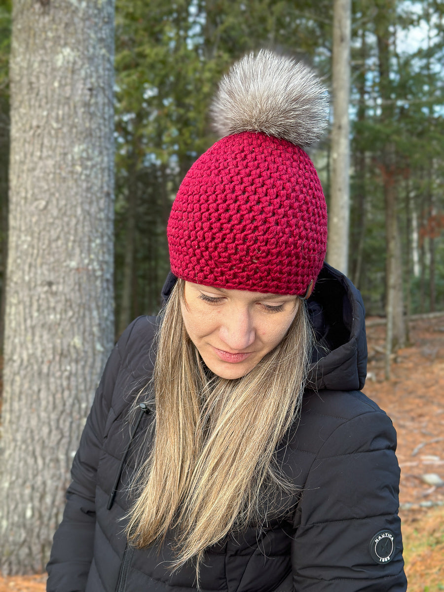 Merino beanie with recycled fur pompom