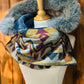 Foulard à capuchon amovible et réversible