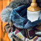 Foulard à capuchon amovible et réversible