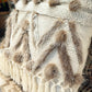 Cushion with recycled fur