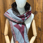 Foulard à capuchon amovible et réversible