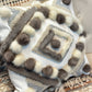 Cushion with recycled fur