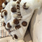 Cushion with recycled fur