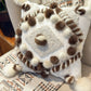 Cushion with recycled fur