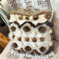 Cushion with recycled fur