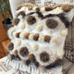 Cushion with recycled fur