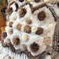 Cushion with recycled fur