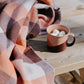 checkered throw with hot chocolat 